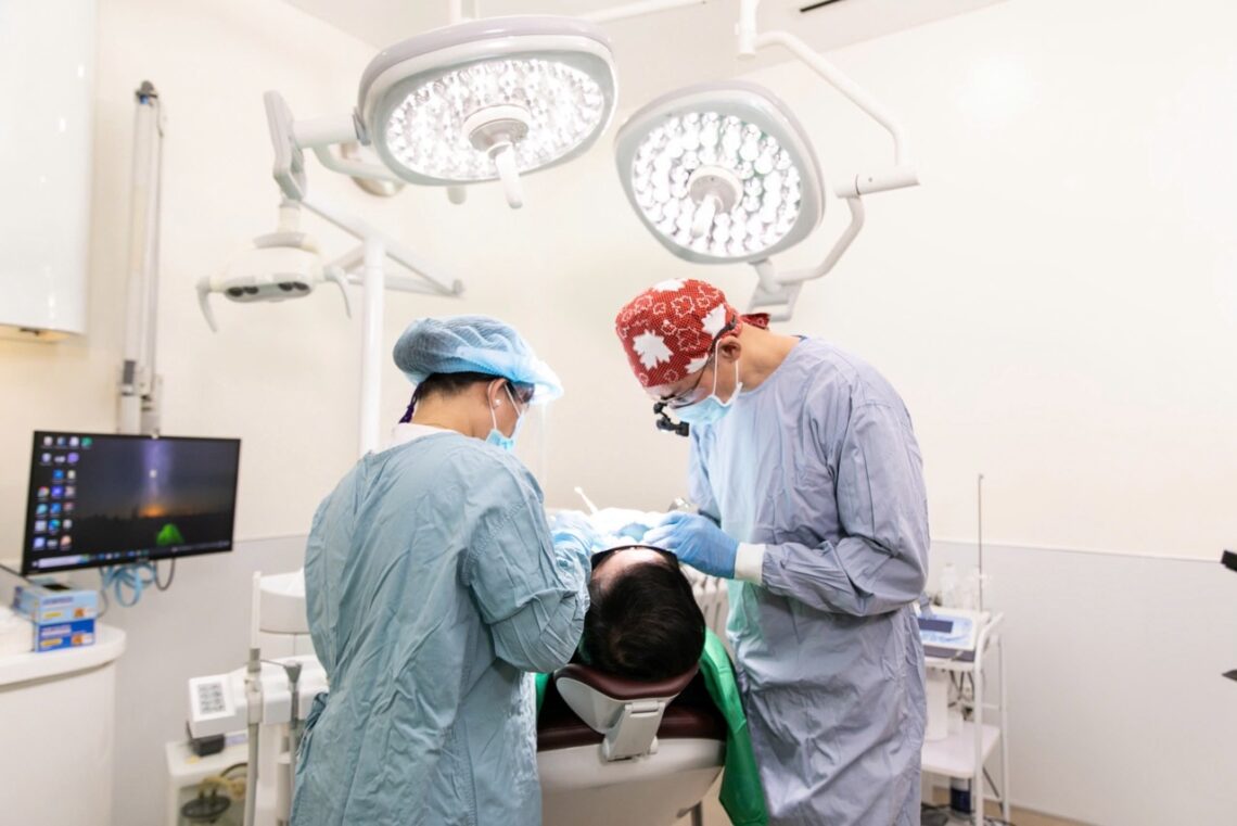 Mr. Vuong during the treatment of 11 dental implants with the doctors